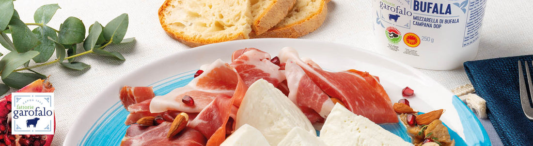 Mozzarella di Bufala Campana DOP con funghi porcini, prosciutto crudo, mandorle tostate e melagrana